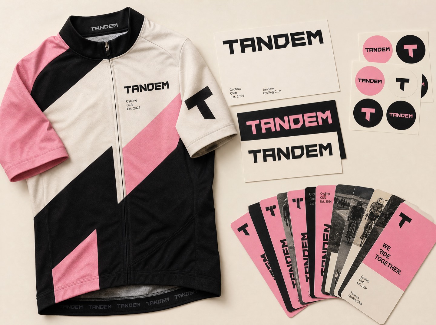 The Tandem identity — jersey graphics, wordmark lockups, and spoke-card ephemera